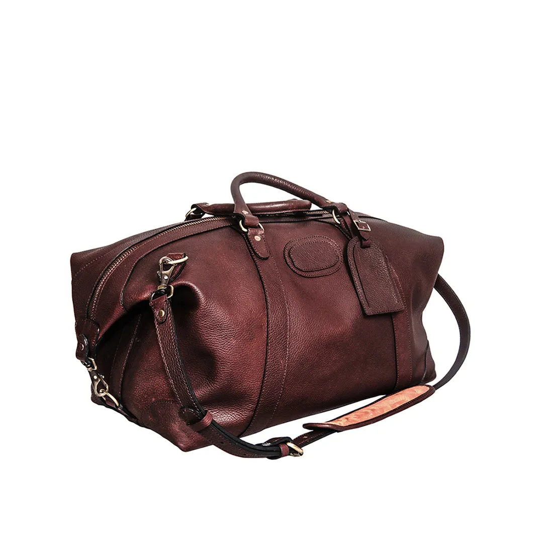 Warm Saddle Brown Cowhide Duffel Bag